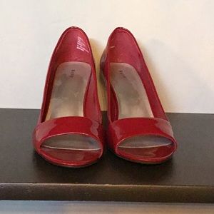 Red peep toe pumps